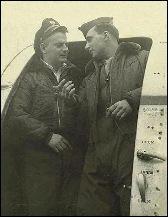 Emerson talking with pilot in the door of a C-47.